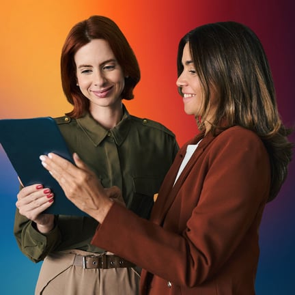 Employees talking using a digital tablet device