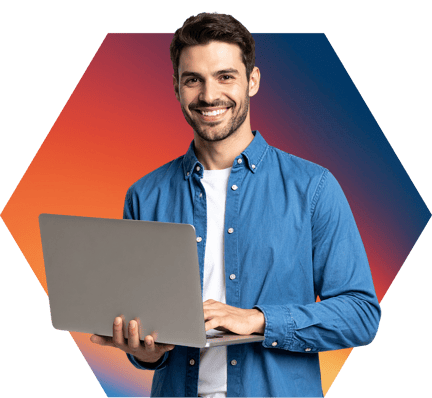 Young IT professional holding a laptop