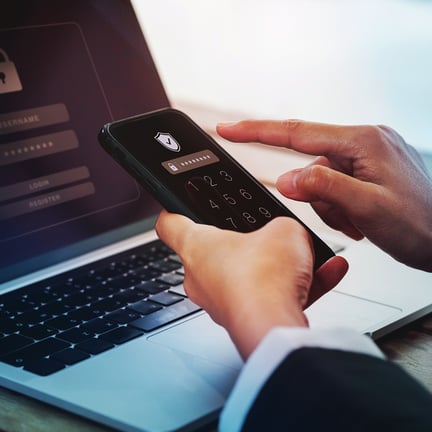 Two steps authentication (2FA) concept. Shield icon and password code showing on smart phone screen