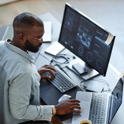 IT professional working on laptop