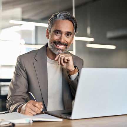 IT consultant working on computer in an office environment