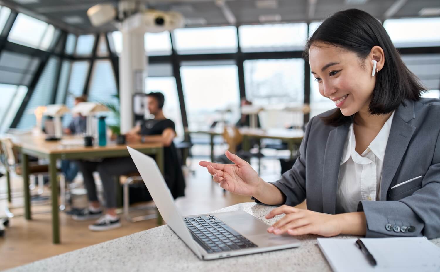 A woman working on her computer