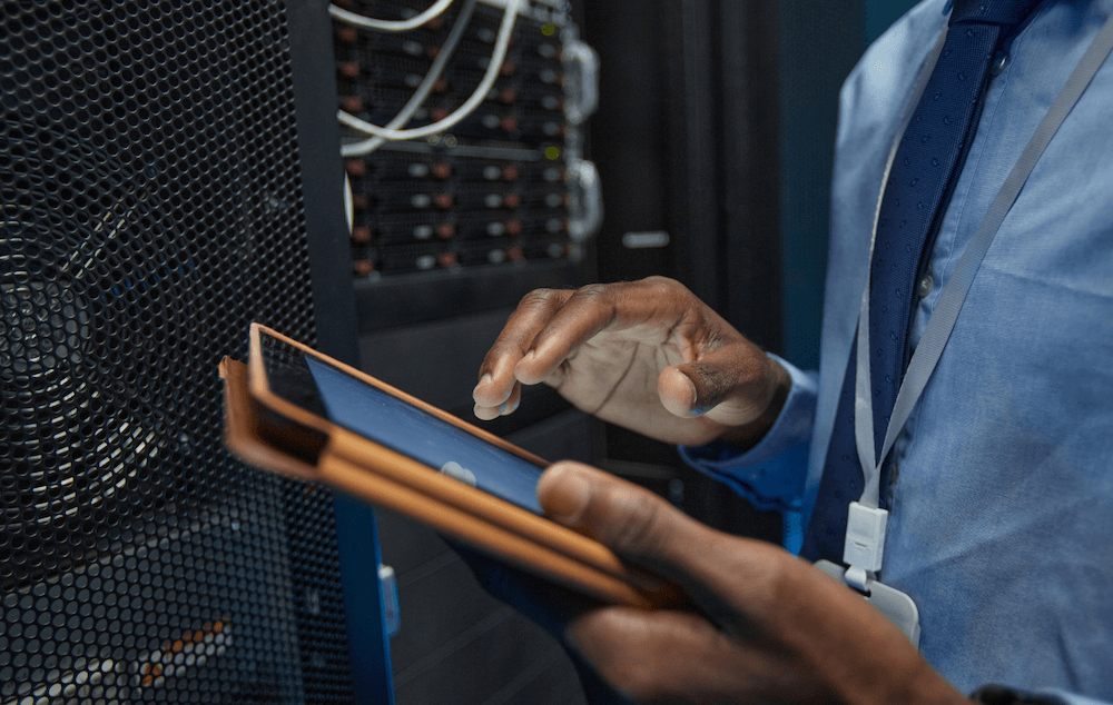 It worker perform onsite server maintenance. 